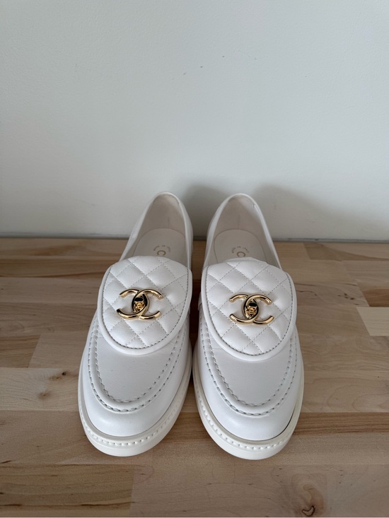 CHANEL Shoes - CHANEL White Quilted Turnlock Leather Loafers